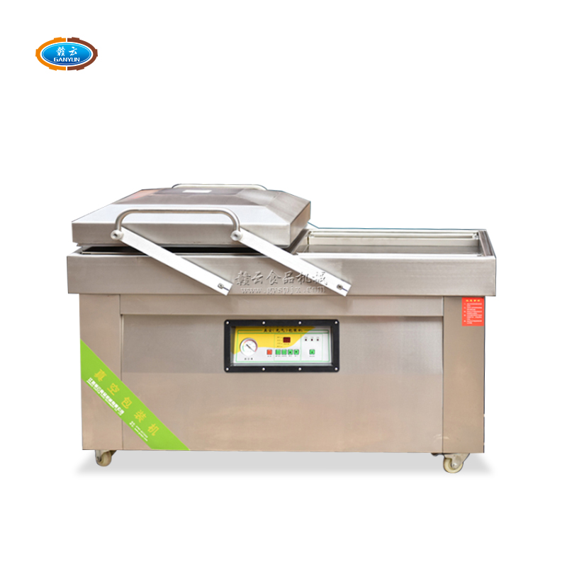 Double-chamber vacuum packaging machine