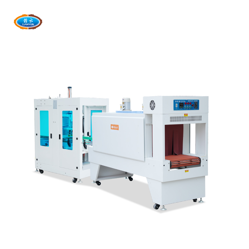 Cuff type film shrinking machi